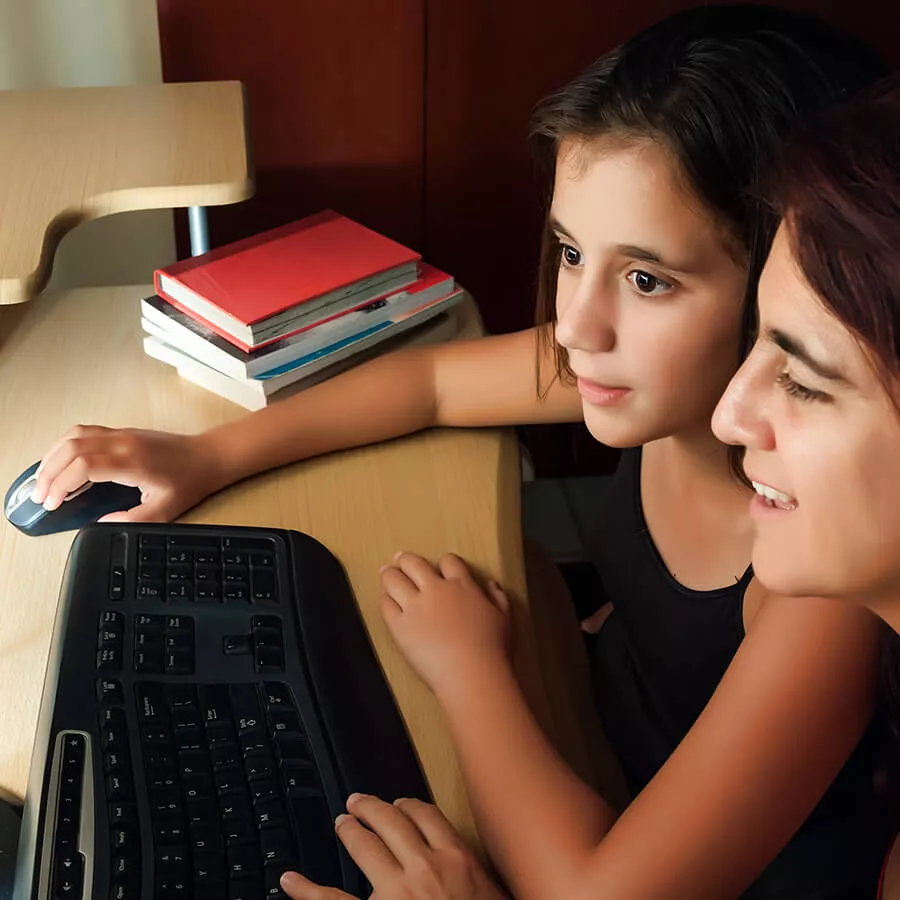 Parent and child using computer
